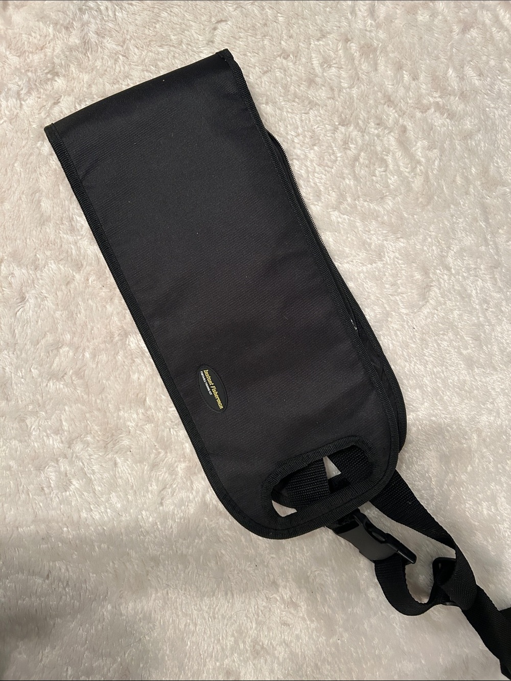 Men's Black Sling Belt Bag with Adjustable Strap for fishing.